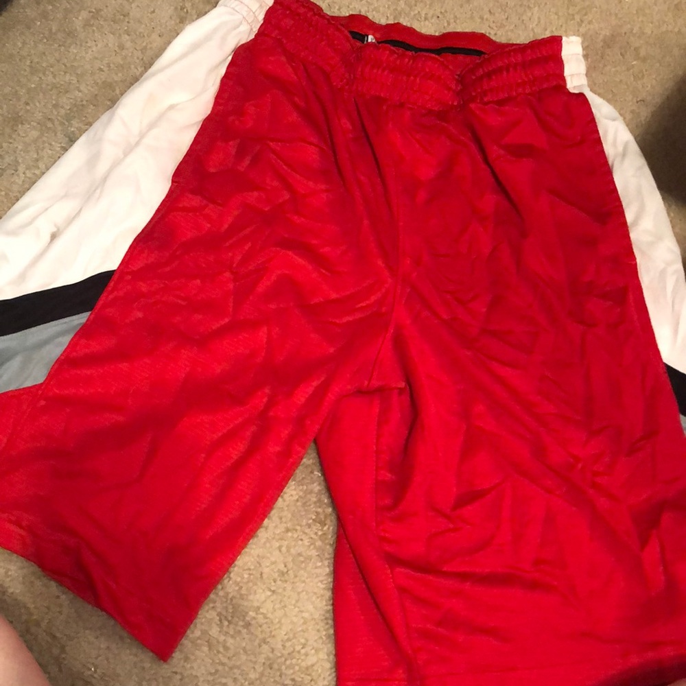 Red Nike shorts
